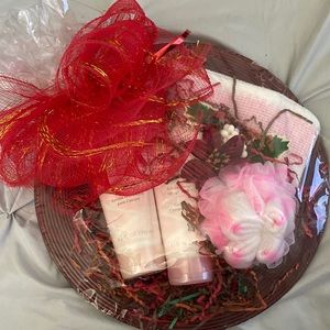 Christmas gift basket. hydration lotion, 2-1 body wash & shave. Poof, towel